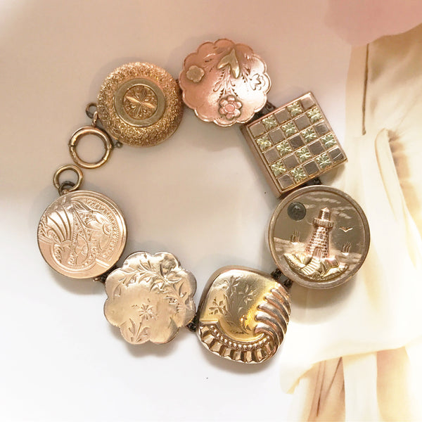 Antique bracelet | rare gold filled handmade folk art button charm | 1930's Art Deco jewelry | lighthouse, flower, checkerboard locket faces